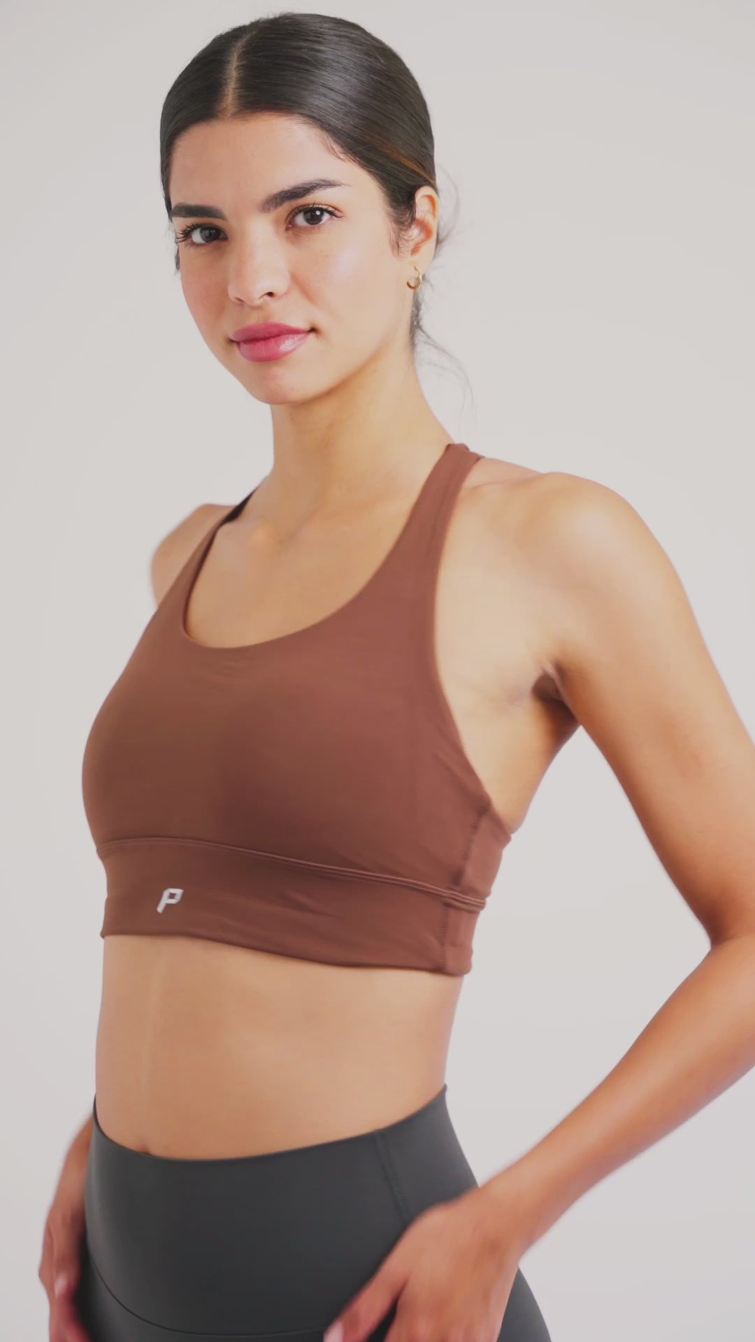 Load video: PilaNova Butter Yellow Strappy Back Top – Soft &amp; Supportive – Chocolate