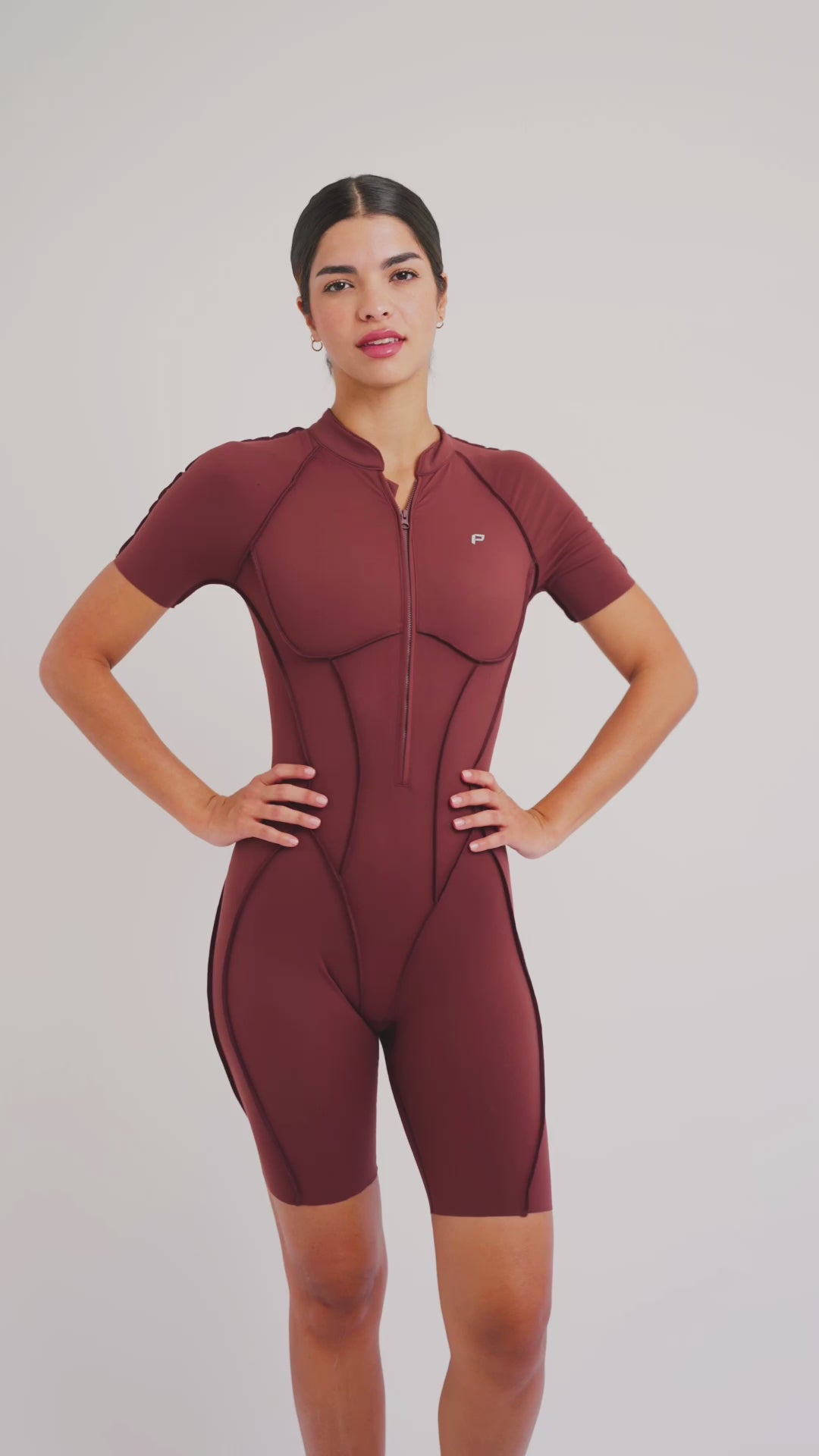 Load video: PilaNova Sleek Shorts Catsuit – Chic Design &amp; Comfortable Fit – Black
