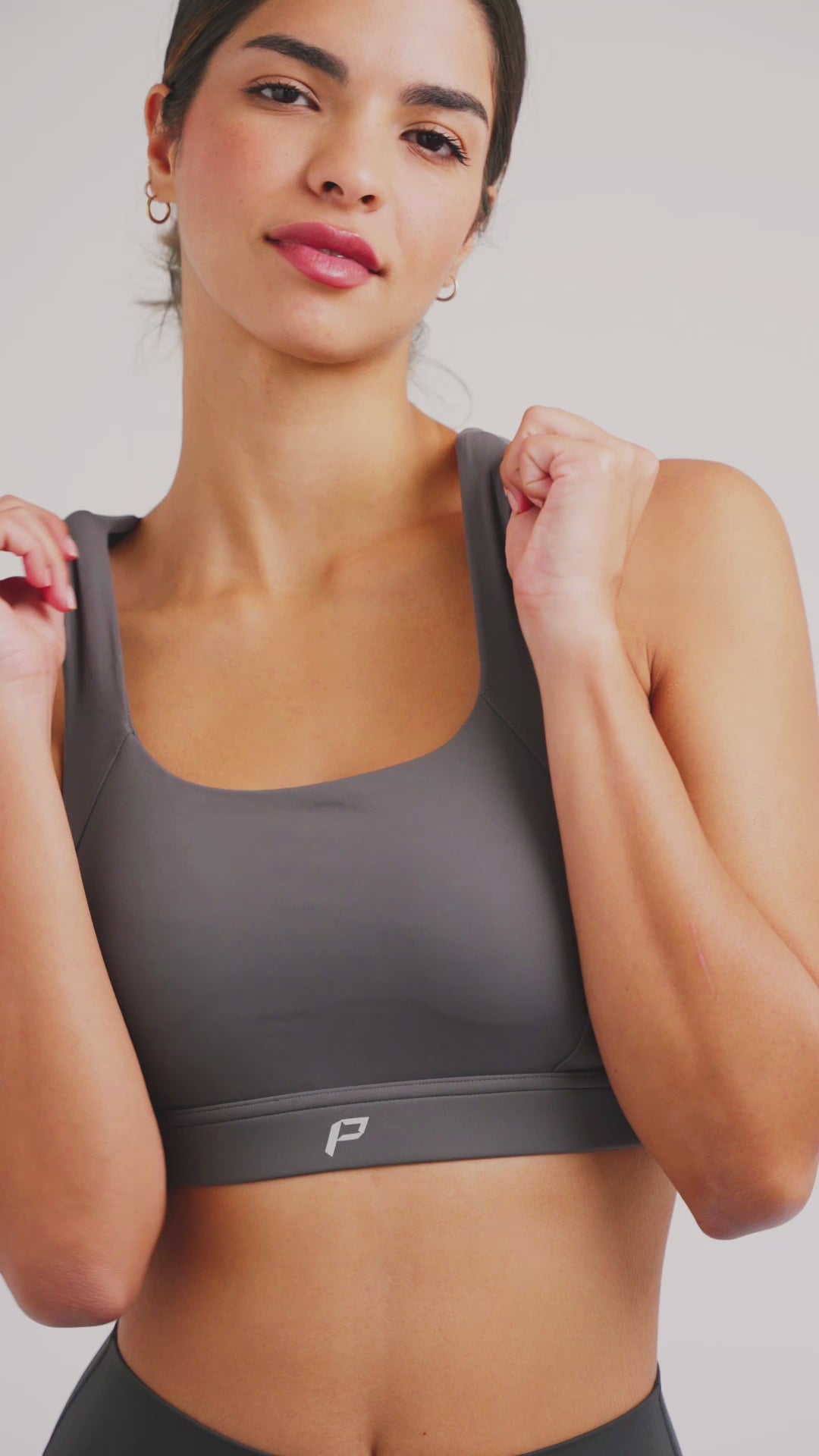 Load video: PilaNova Plunge Neck Bra Top – Soft Fabric &amp; Stylish Support – Dark Gray