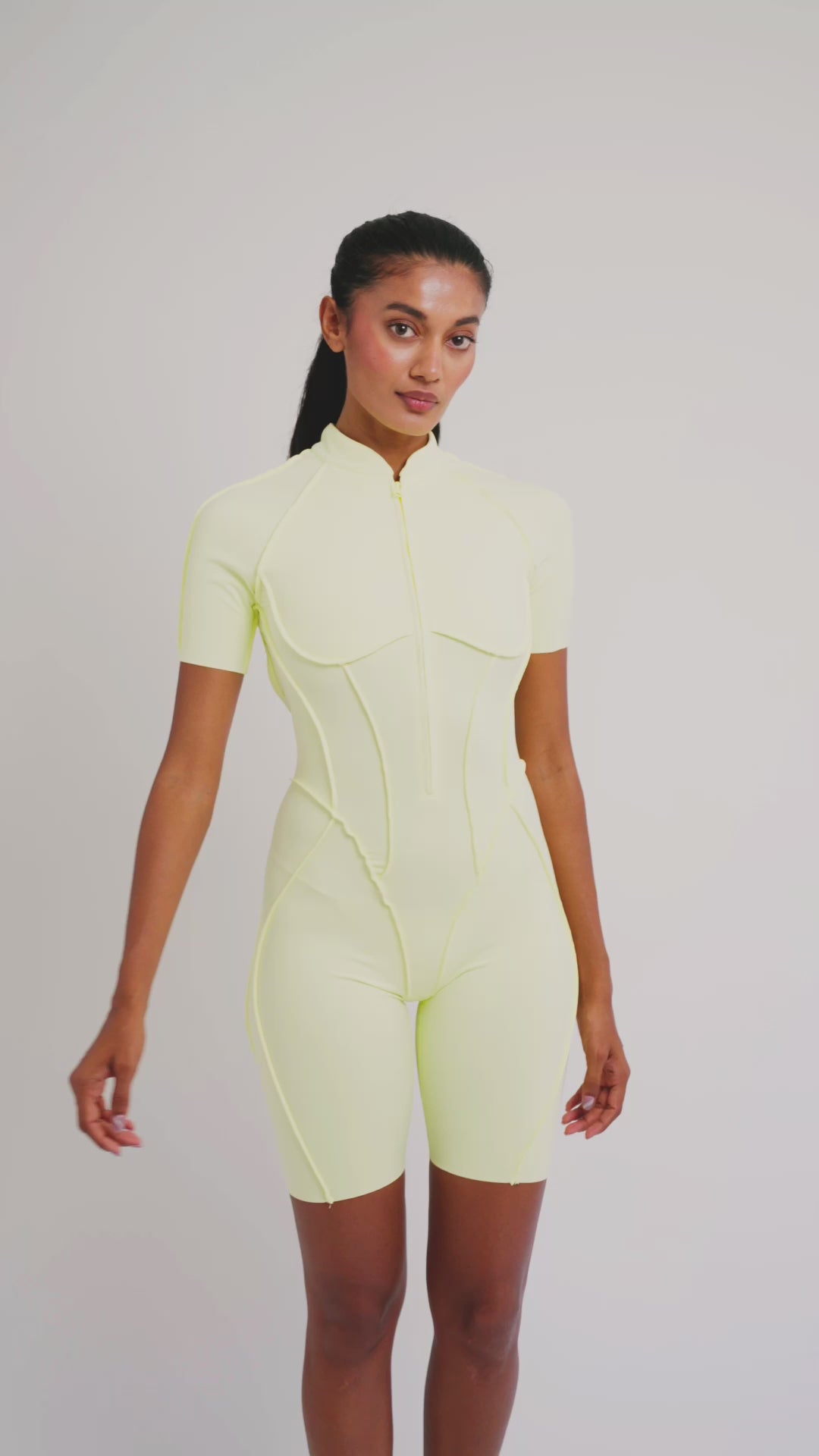 Load video: PilaNova Sleek Shorts Catsuit – Chic Design &amp; Comfortable Fit